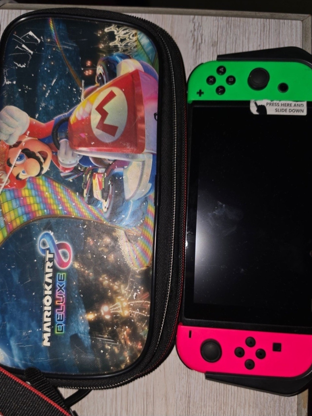 Nintendo Handheld Console with Neon Green & Neon Pink Joy-Con